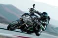 The SE is slightly heavier, around 240 kg, versus 239 kg for the Z H2 Kawasaki Z H2 cornering shot left profile